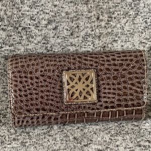 Wallet with silver embellishment